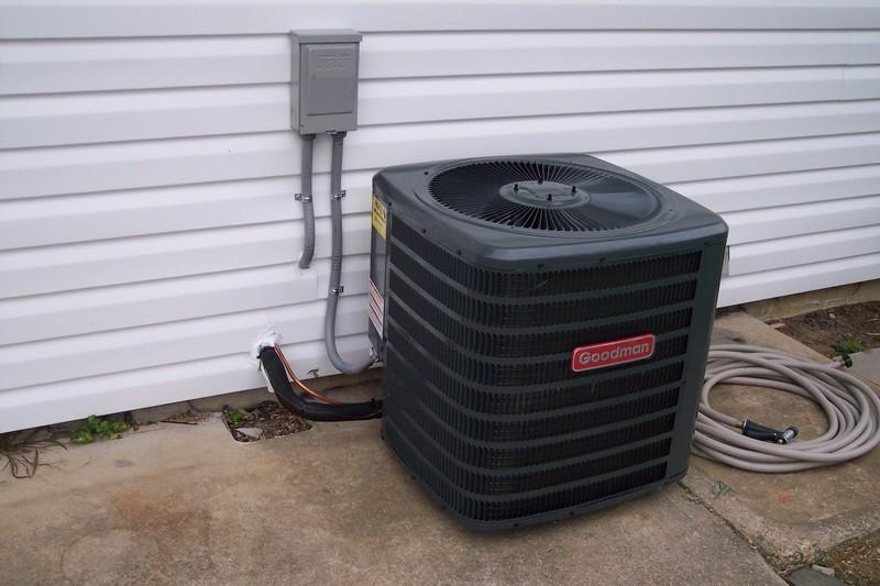 Goodman outdoor AC condenser unit installed at Cinnaminson residence