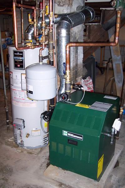 Williamson boiler and water heater installation in residential basement